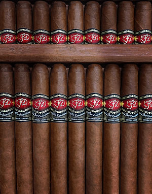 Rows of La Flor Dominicana cigars with red LFD bands and black secondary bands