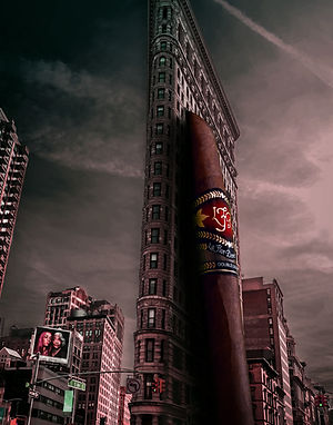 Oversized cigar sculpture or advertisement with LFD red band in a city scene