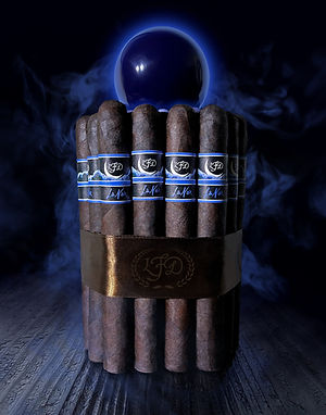 Bundle of La Flor Dominicana La Nox cigars with blue bands and a gold LFD ribbon on a dark background.