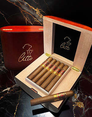 Open wooden box of Litto-branded cigars with a closed box showing the Litto logo