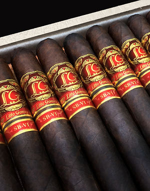 Box of La Flor Dominicana Litto Gomez cigars with red and gold LG bands
