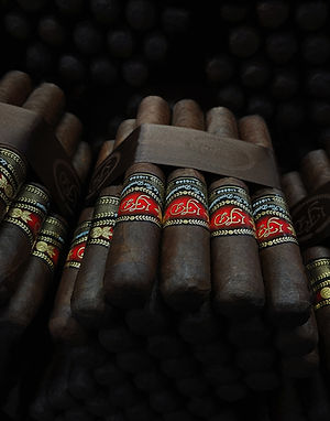 Bundled La Flor Dominicana Ligero cigars with red and gold bands