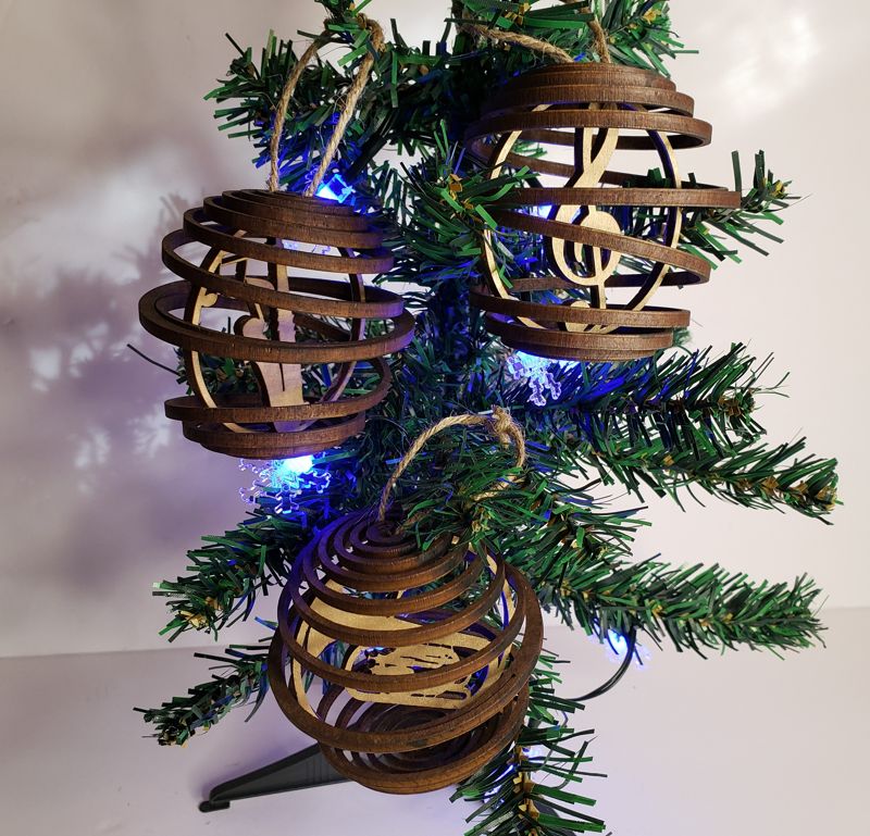 Handcrafted Spiral Wood Globe Ornament - Unique Laser-Cut Musician's Gift - Personalized Instrument Nesting - Customizable Colors