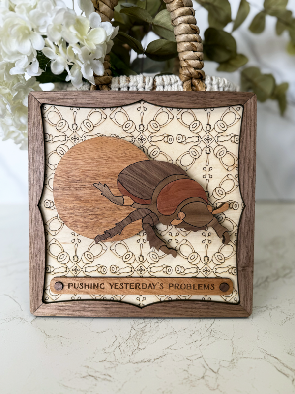 Dung Beetle Motivational Wooden Plaque – “Pushing Yesterday’s Problems” Engraved Wall Art