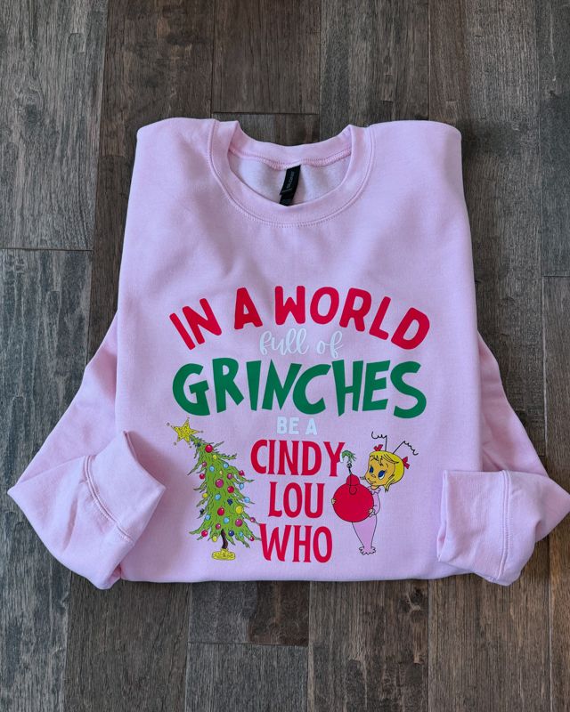 In a World Full of Grinches (Unisex T-Shirt)